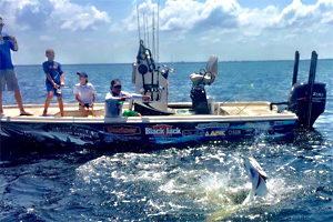 Bo Johnson fights a tarpon off Pine Island Florida